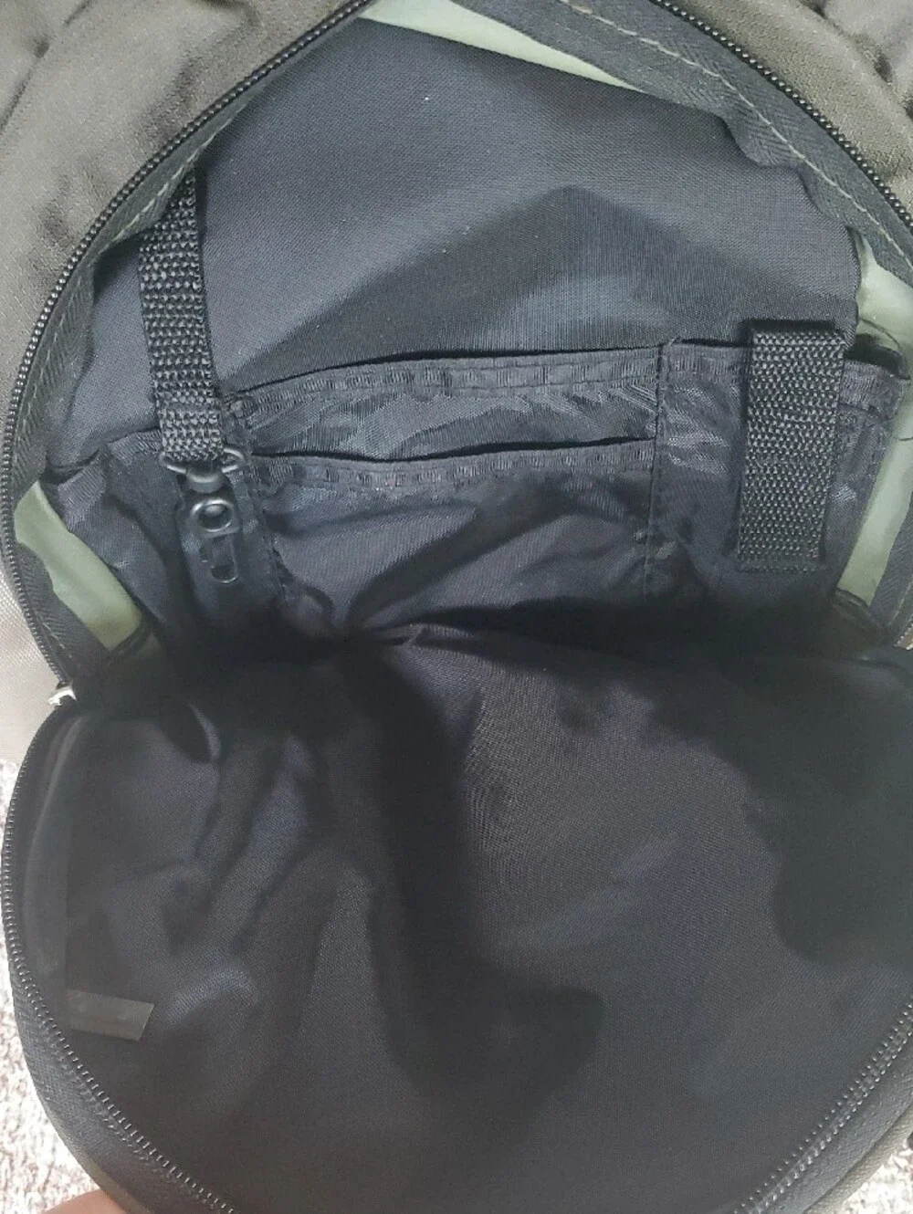 Eastsport Olive and Tan Sling Backpack. Multiple Pockets